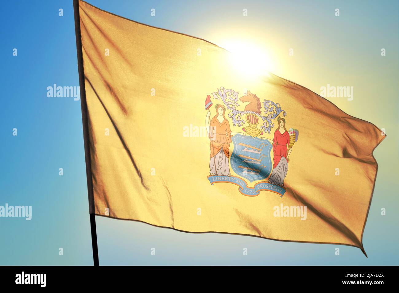 New Jersey state of United States flag waving on the wind Stock Photo