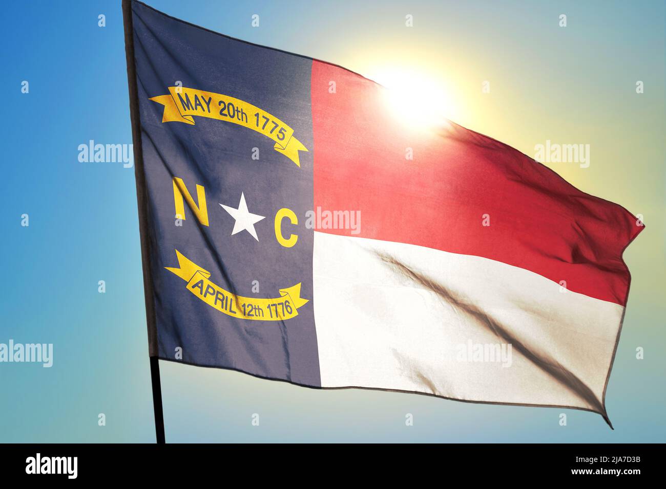 North Carolina state of United States flag waving on the wind Stock Photo