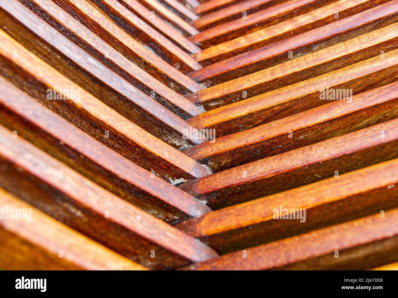 tung oil on hardwood garden chair Stock Photo
