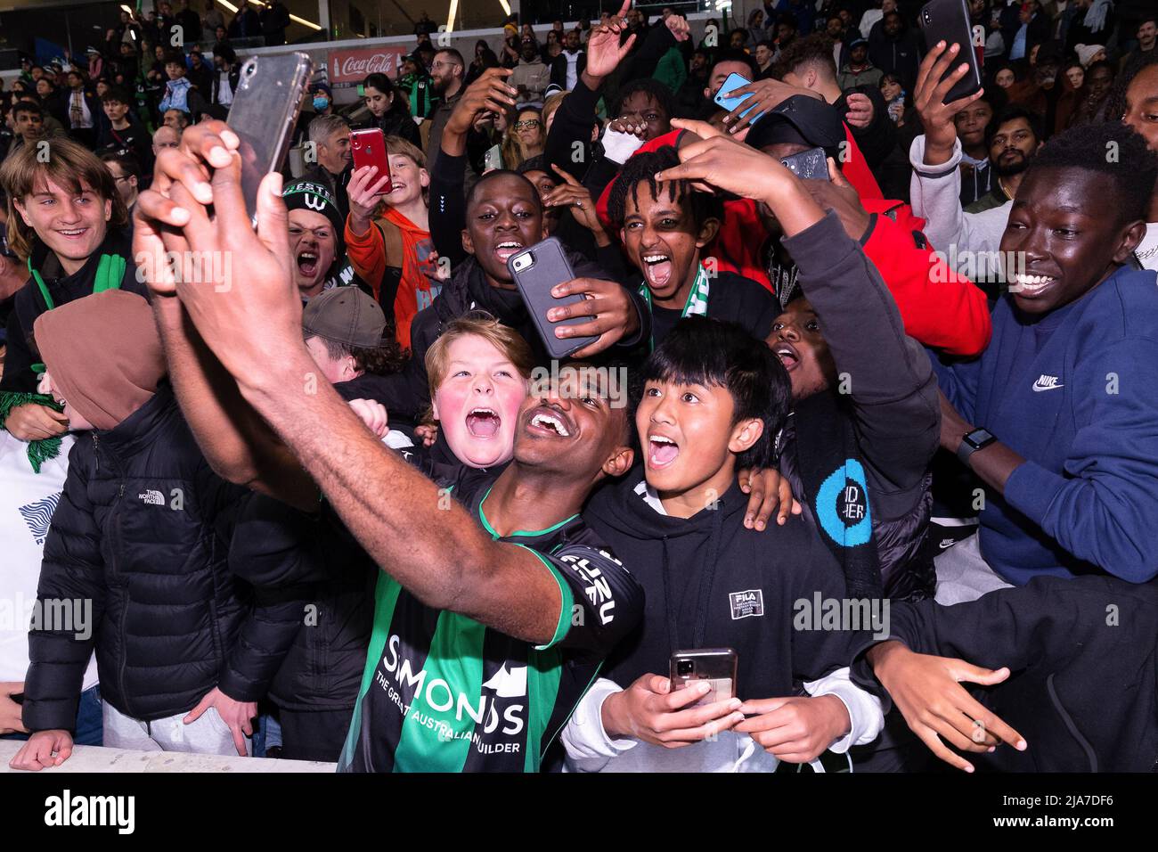 Melbourne, Australia, 28 May, 2022. Adisu Bayew of Western United celebrates with fans after winning during the A-League Grand Final soccer match between Melbourne City FC and Western United at AAMI Park on May 28, 2022 in Melbourne, Australia. Credit: Mikko Robles/Speed Media/Alamy Live News Stock Photo