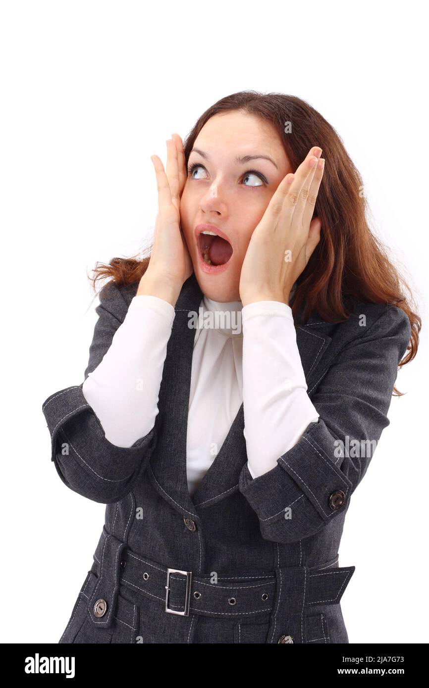 portrait of surprised young woman over grey background Stock Photo - Alamy