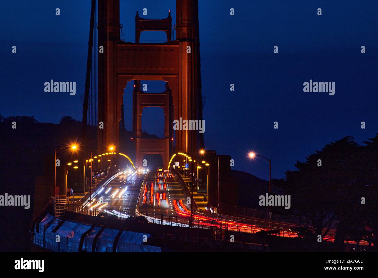 Golden Gate Bridge at night with traffic blurred Stock Photo - Alamy