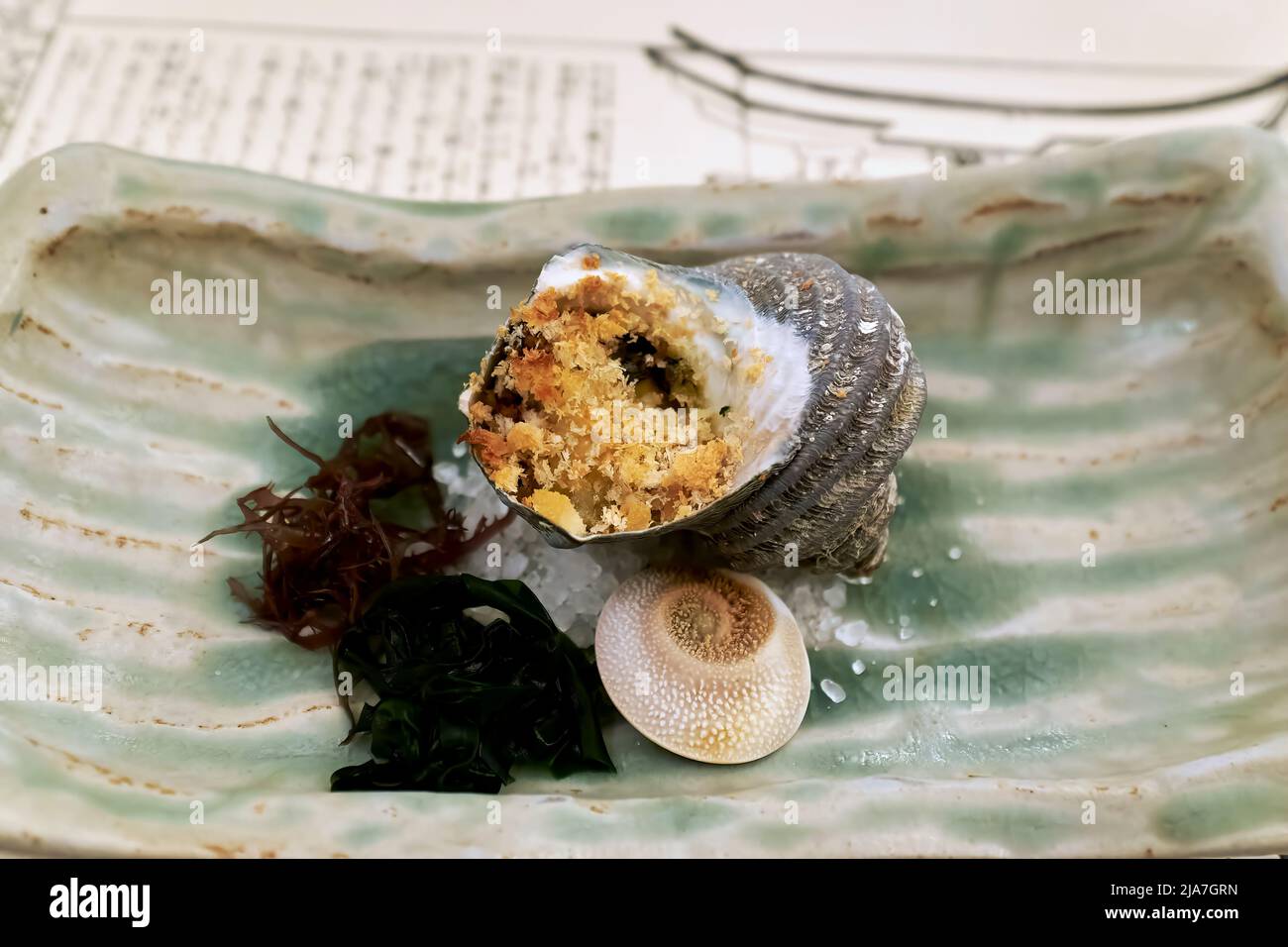 Japan. Miyajima. Hiroshima. Traditional japanese cuisine in a restaurant. Snails Stock Photo