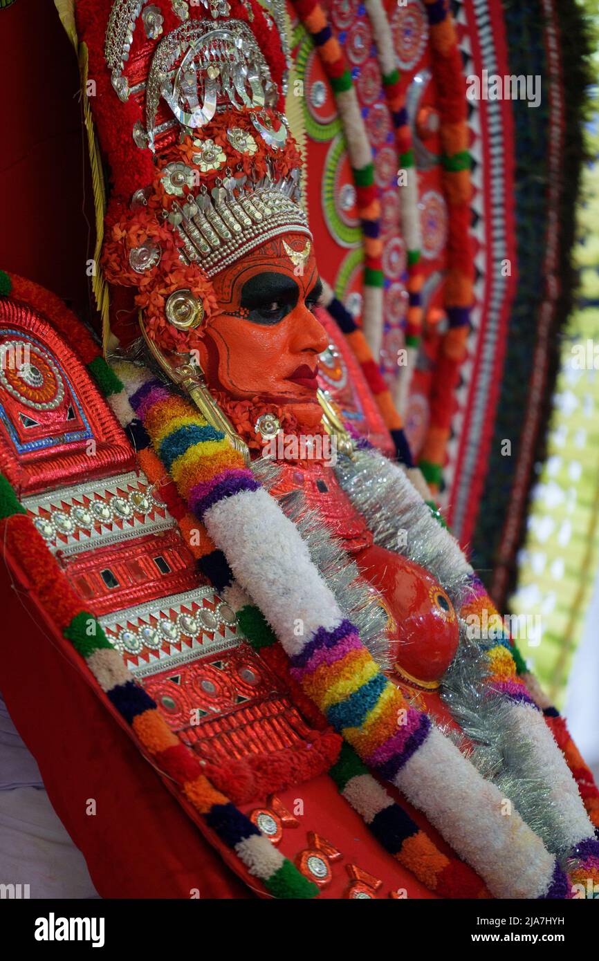Theyyam is a famous ritual art form in kerala with face painted using