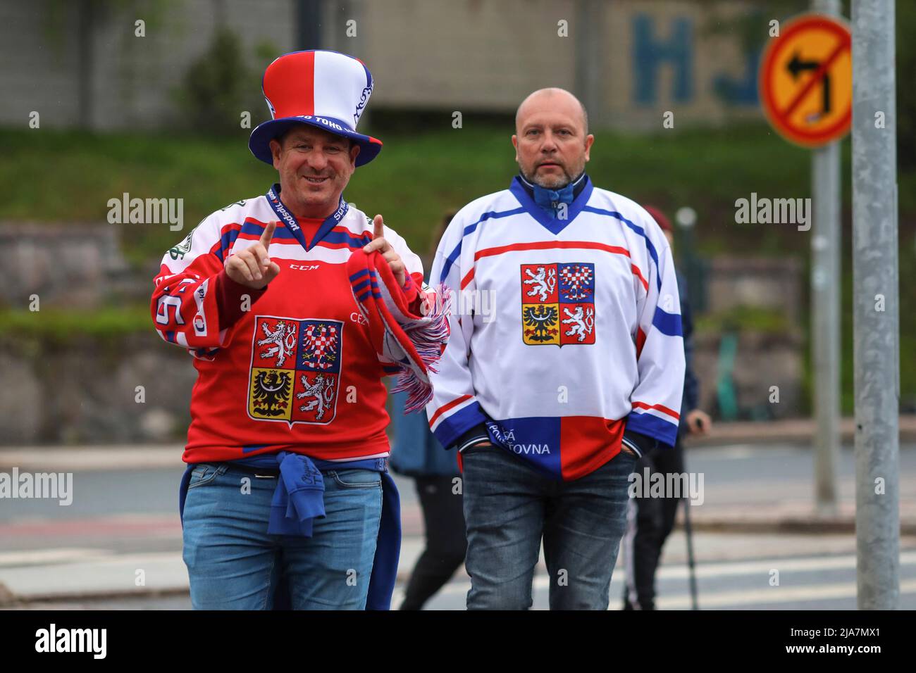 Fans of the Czech ice hockey national team celebrate the victory of their team in the quarterfinal of the Ice Hockey World Championship 2022. Fans came from all over the world to support their teams at Helsinki Ice Hall. Stock Photo