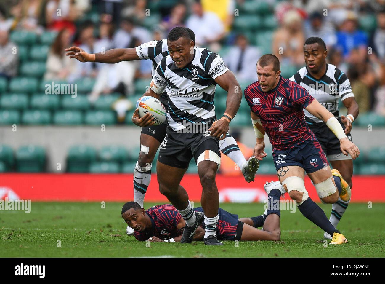 Elia Canakaivata of Fiji Rugby, evades the tackle from Perry Baker of USA, Stock Photo