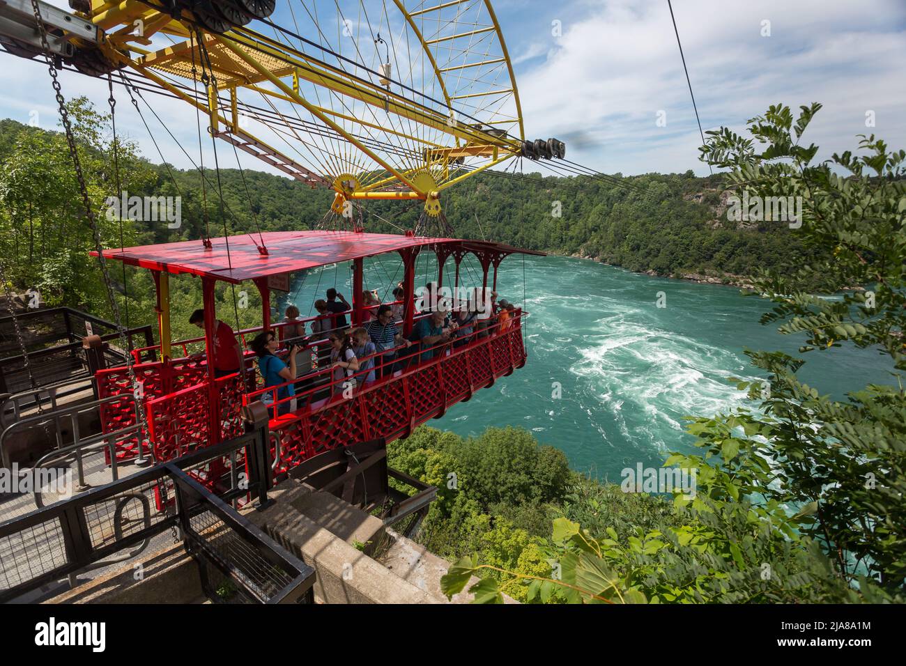 The Whirlpool Aero Car taking tourists and visitors for a ride over the whirlpool of the Niagara River. Niagara Falls, Ontario, Canada - AUG 2019 Stock Photo