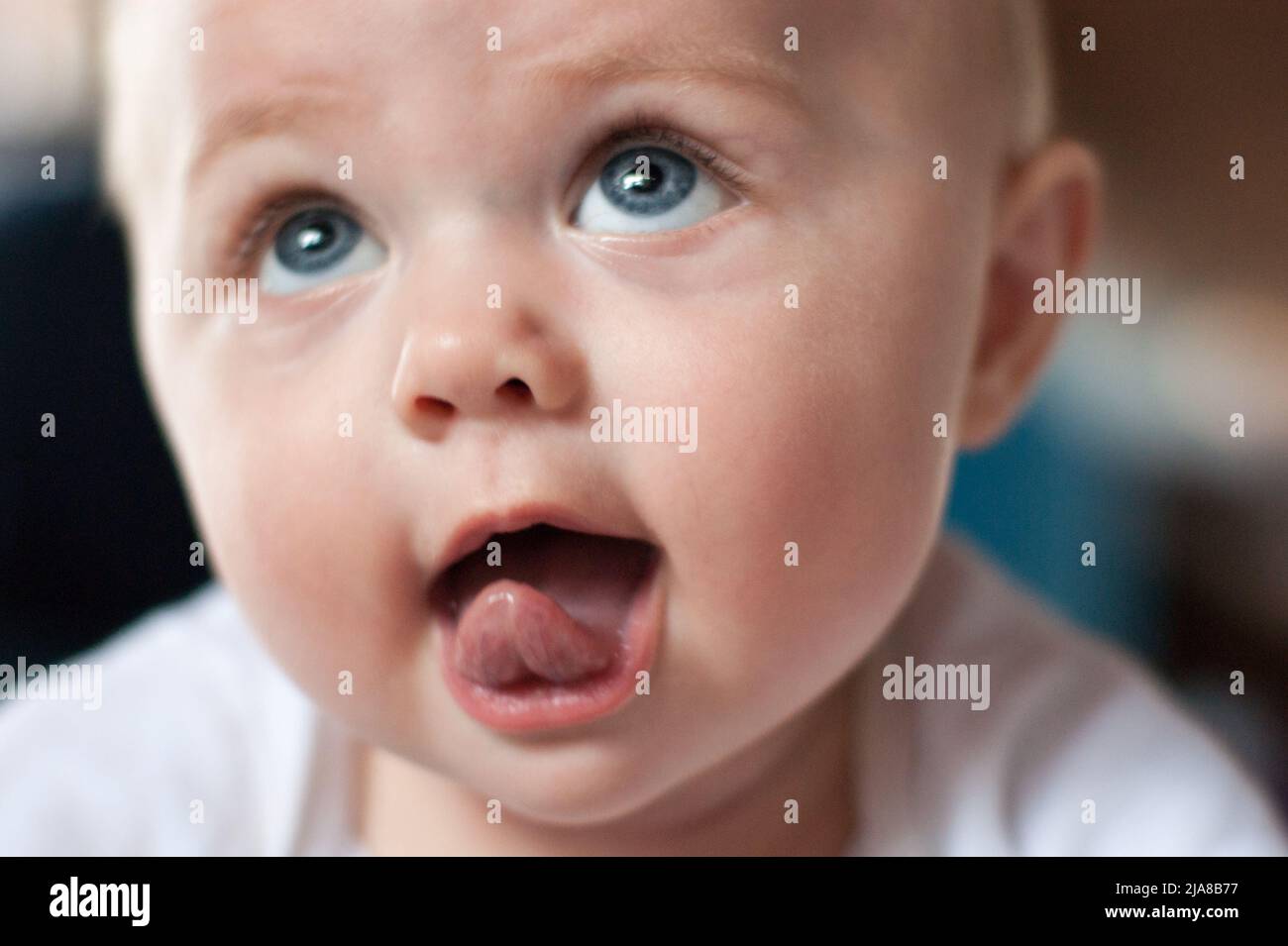 Baby sticking out tongue funny hires stock photography and images Alamy