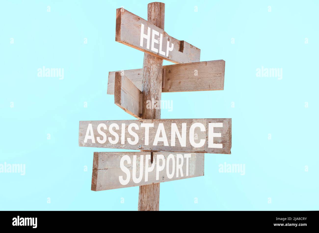 Wooden road sign with words help, support, assistance, love, success ...
