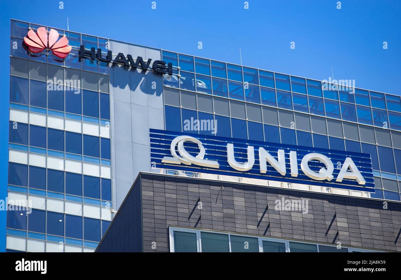 Bucharest, Romania - May 20, 2022: A logo of Huawei, Chinese telecommunications equipment company and UNIQA Insurance Group AG, are displayed at the t Stock Photo