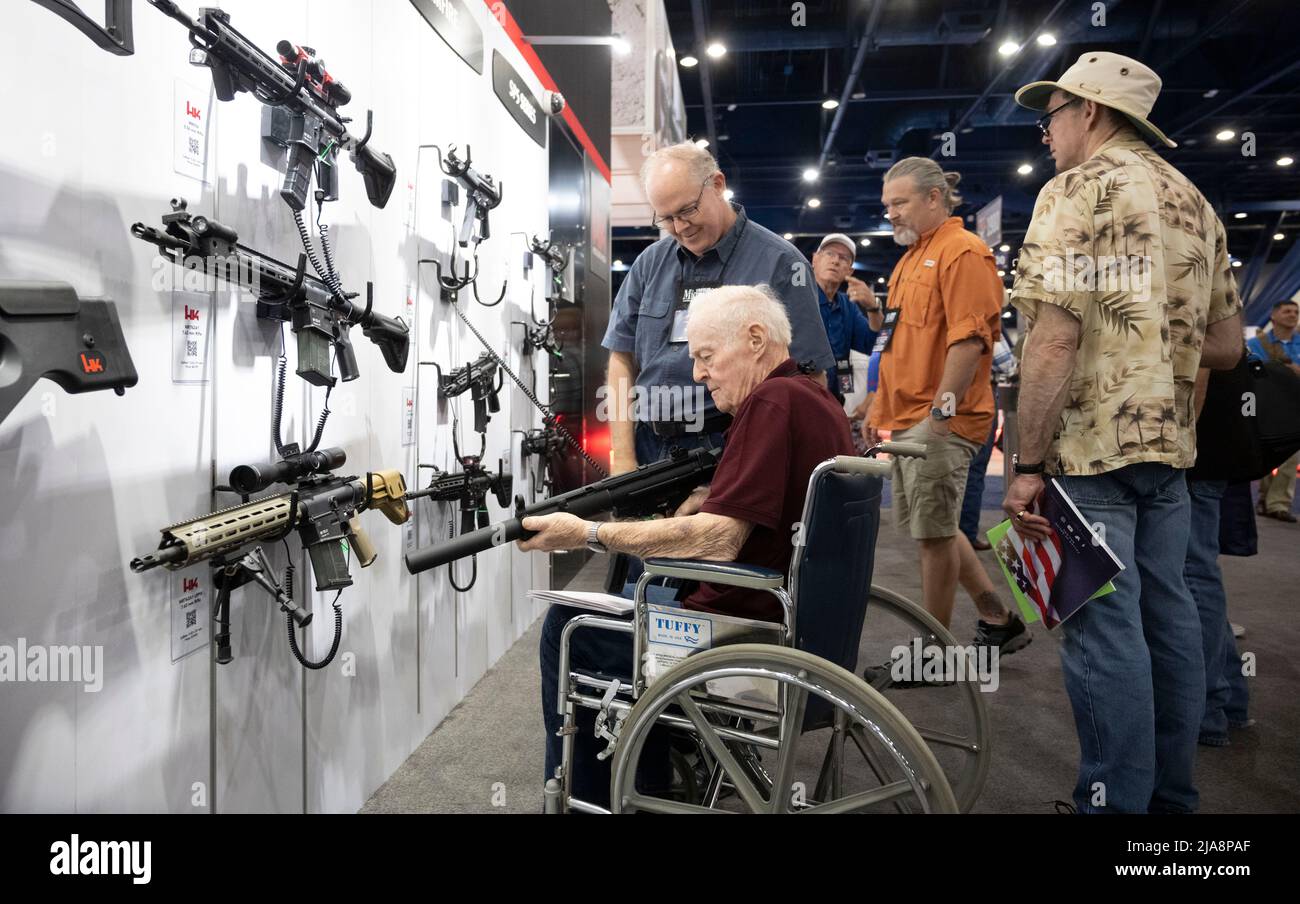 Houston, Texas United States, 28th May 2022: Gun enthusiasts shop for firearms, ammunition and outdoor products at the HK booth Saturday morning at the National Rifle Association's (NRA) trade show. The exhibits cover almost 14 acres inside the George R. Brown Convention Center. Credit: Bob Daemmrich/Alamy Live News Stock Photo