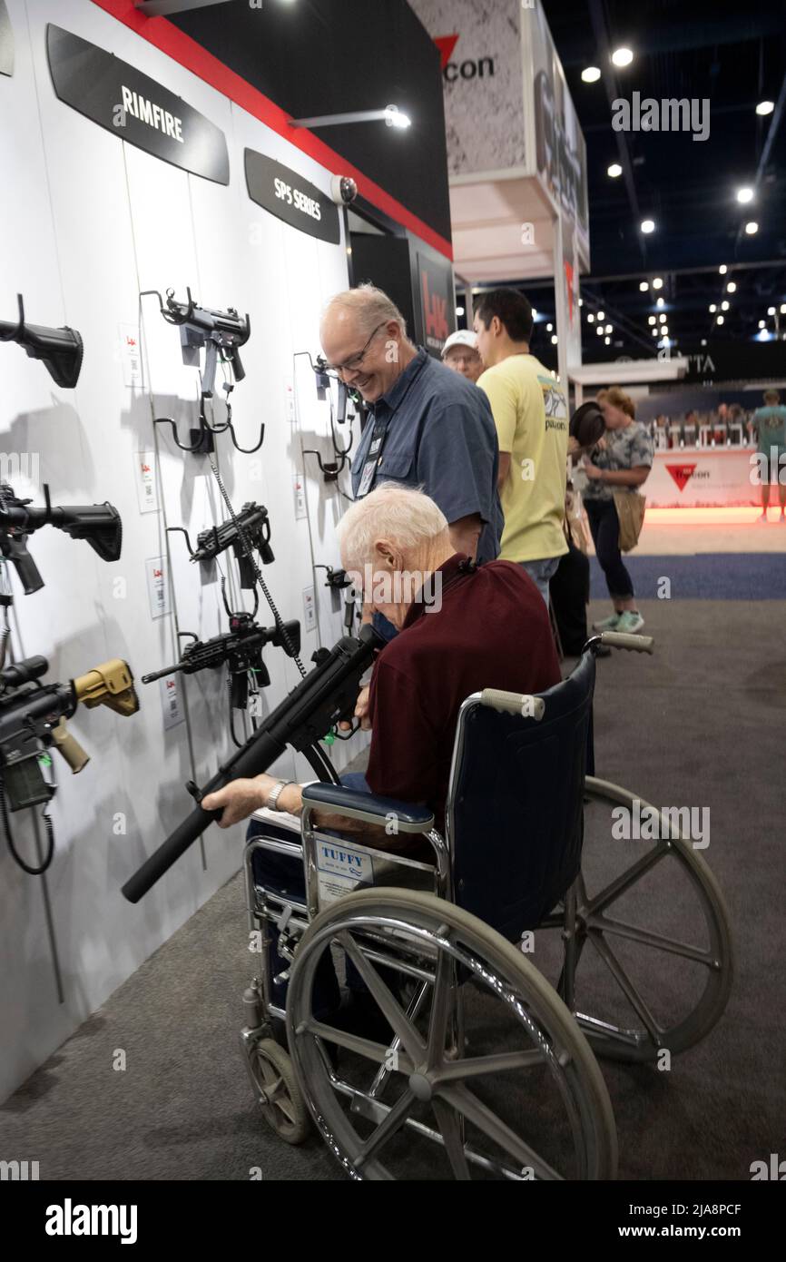 Houston, Texas United States, 28th May 2022: Gun enthusiasts shop for firearms, ammunition and outdoor products at the HK booth on Saturday morning at the National Rifle Association's (NRA) trade show. The exhibits cover almost 14 acres inside the George R. Brown Convention Center. Credit: Bob Daemmrich/Alamy Live News Stock Photo