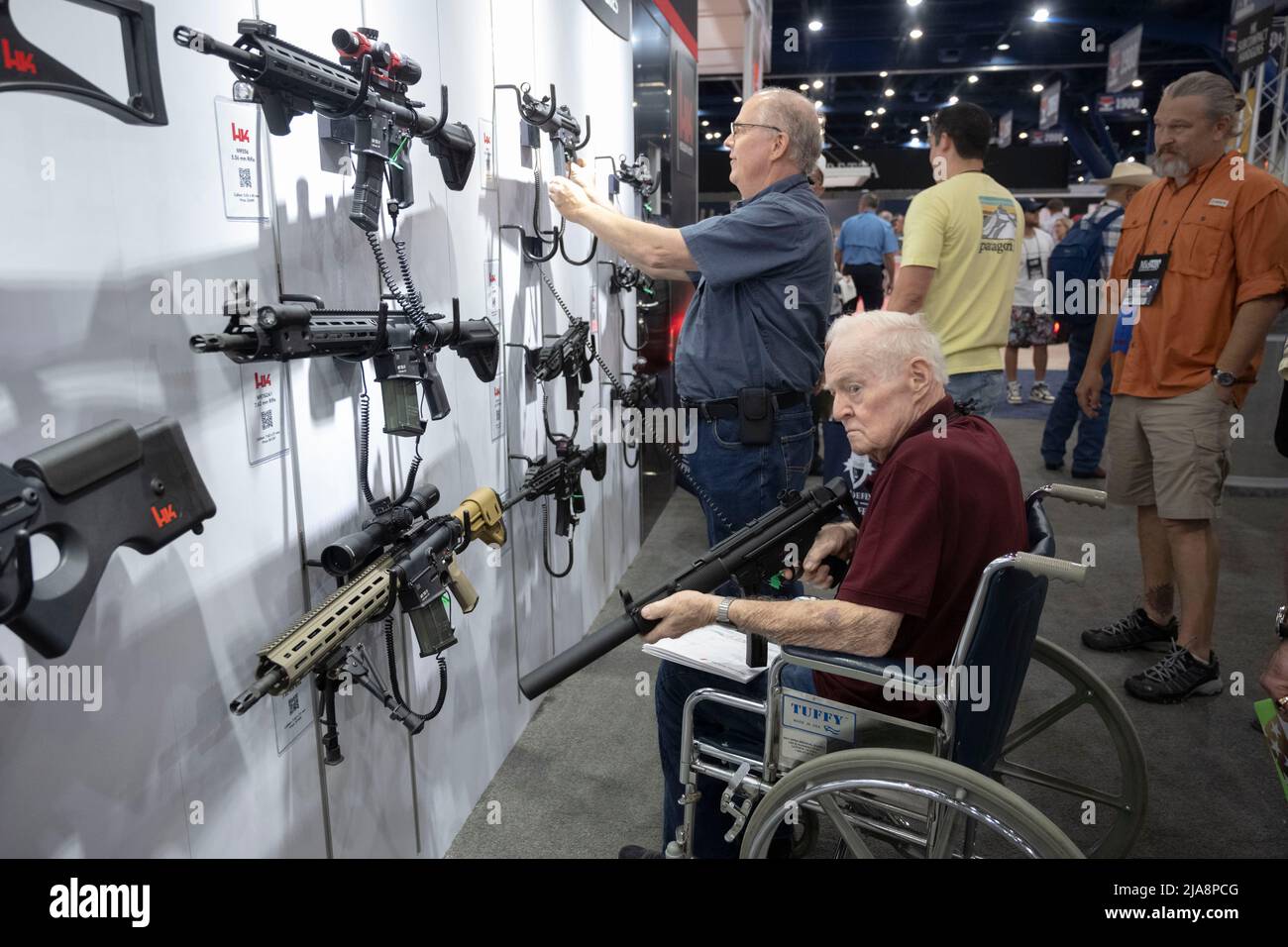 Houston, Texas United States, 28th May 2022: Gun enthusiasts shop for firearms, ammunition and outdoor products at the HK booth on Saturday morning at the National Rifle Association's (NRA) trade show. The exhibits cover almost 14 acres inside the George R. Brown Convention Center. Credit: Bob Daemmrich/Alamy Live News Stock Photo