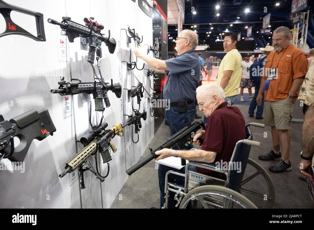 Houston, Texas United States, 28th May 2022: Gun enthusiasts shop for firearms, ammunition and outdoor products at the HK booth at the National Rifle Association's (NRA) trade show. The exhibits cover almost 14 acres inside the George R. Brown Convention Center. Credit: Bob Daemmrich/Alamy Live News Stock Photo