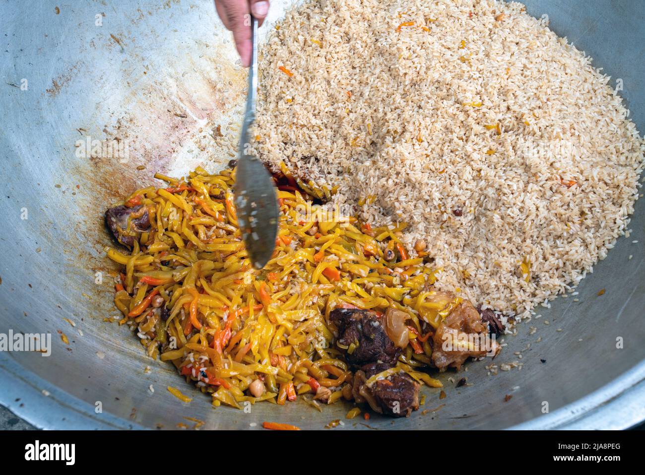 Pilaf from rise , meat and onion ( baked) national uzbek dish from
