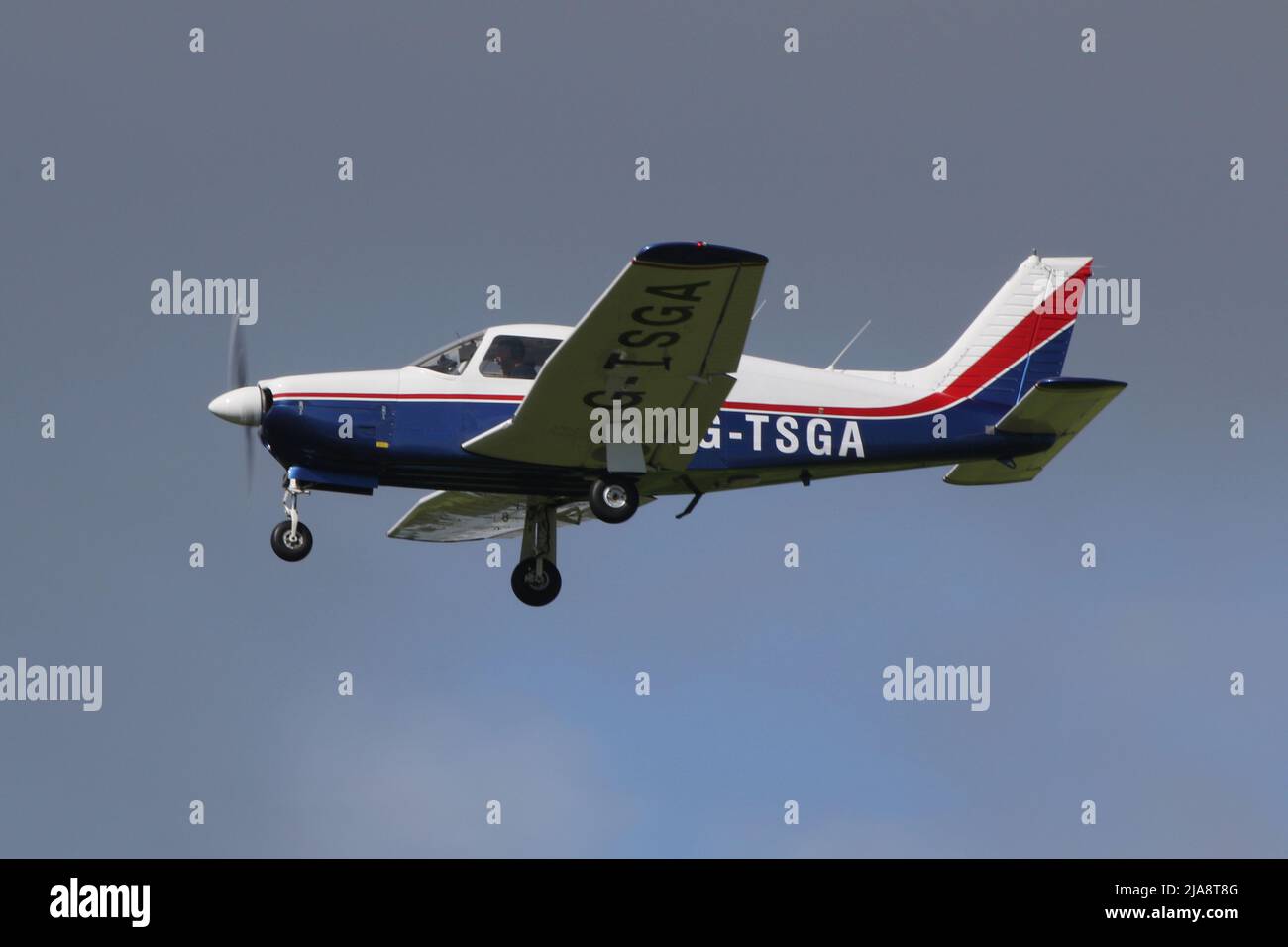 G-TSGA, a privately-owned Piper PA-28R-201 Arrow III, arriving at Prestwick International Airport in Ayrshire, Scotland. Stock Photo