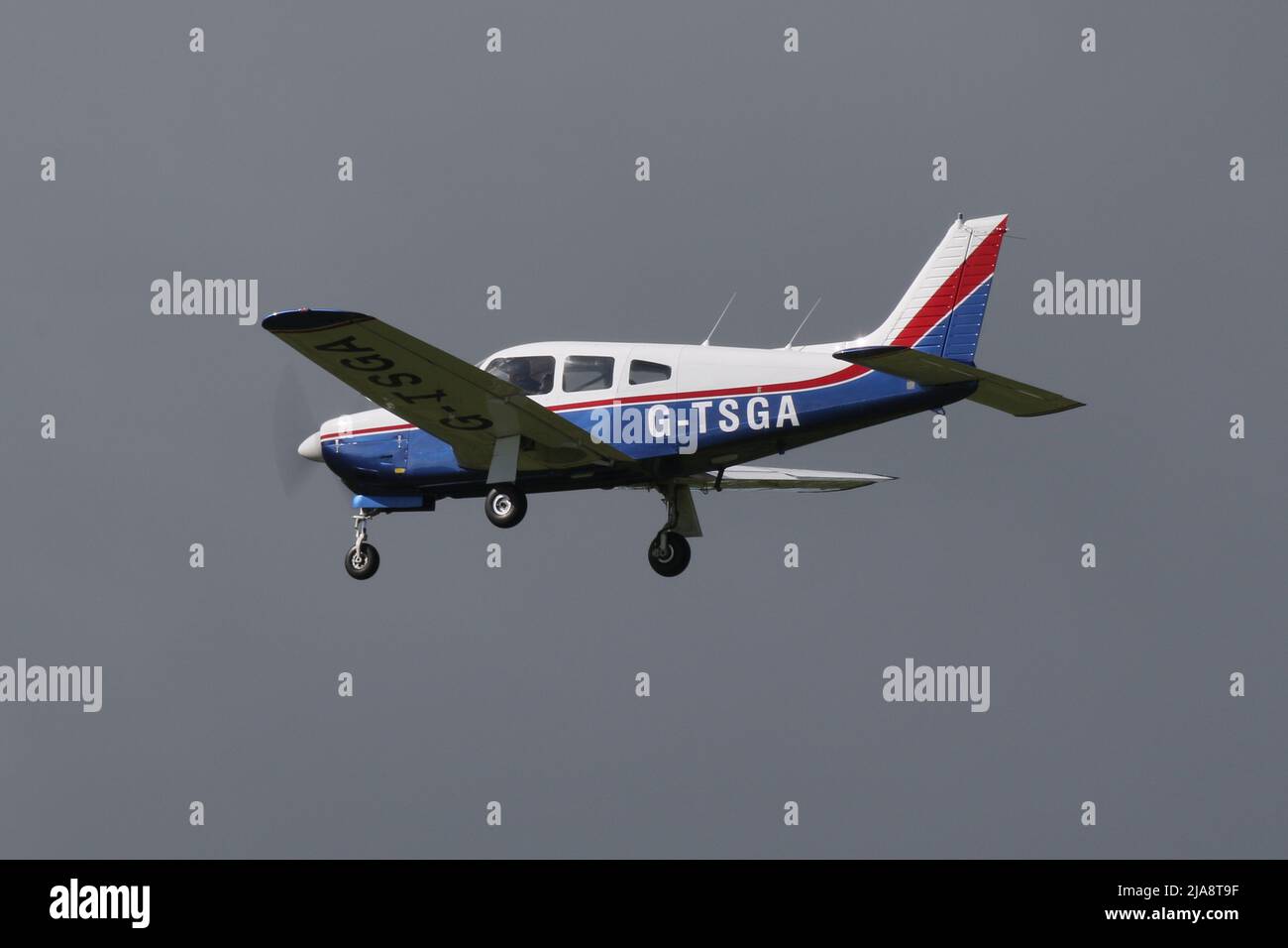 G-TSGA, a privately-owned Piper PA-28R-201 Arrow III, arriving at Prestwick International Airport in Ayrshire, Scotland. Stock Photo
