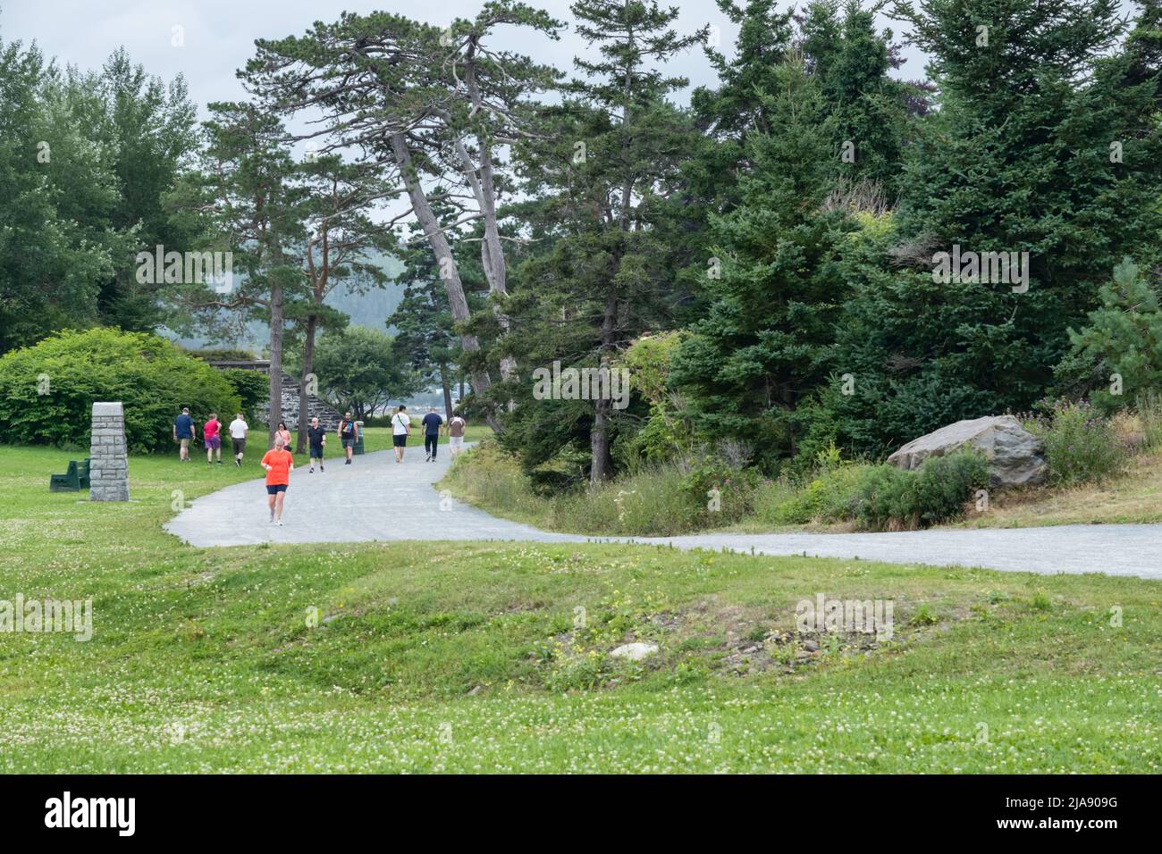 Halifax, Nova Scotia, Canada - 10 August 2021: People walking and running in Point Pleasant Park Stock Photo
