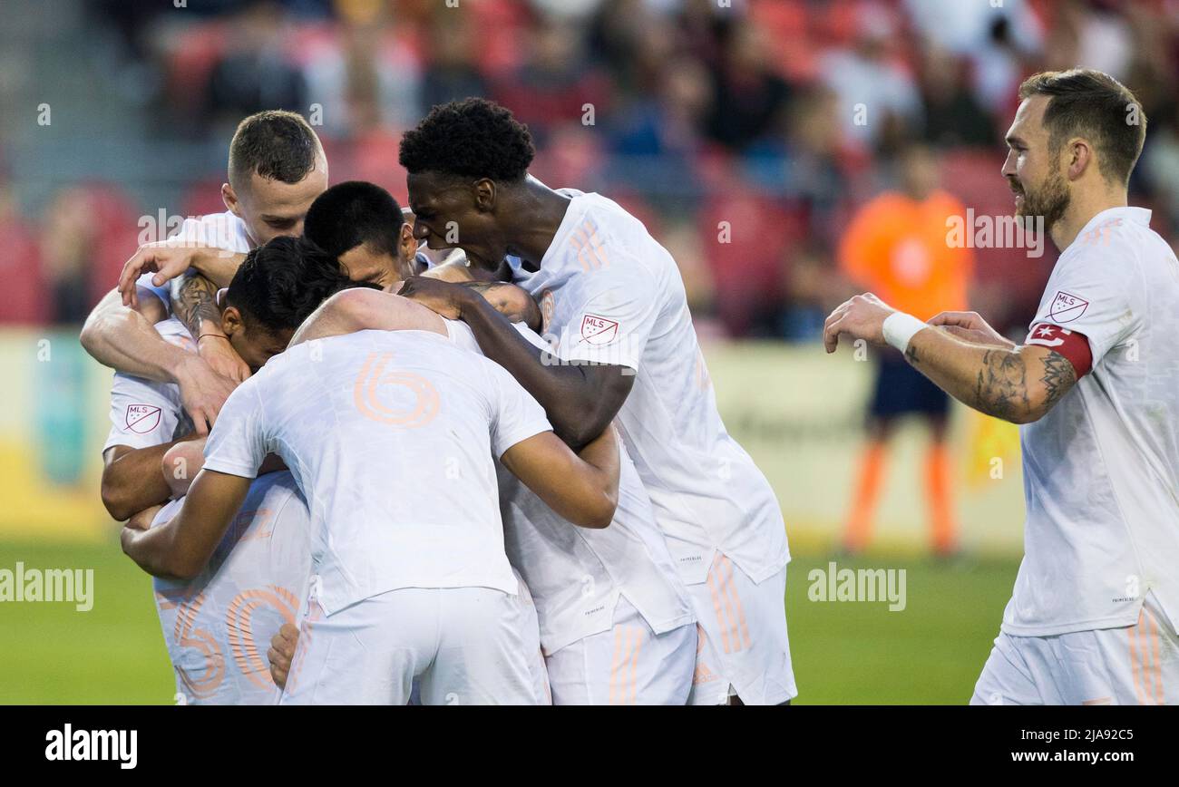 Toronto, Canada. 28th May, 2022. Players of Chicago Fire celebrate scoring during the 2022 Major League Soccer (MLS) match between Chicago Fire and Toronto FC at BMO Field in Toronto, Canada, on May 28, 2022. Credit: Zou Zheng/Xinhua/Alamy Live News Stock Photo