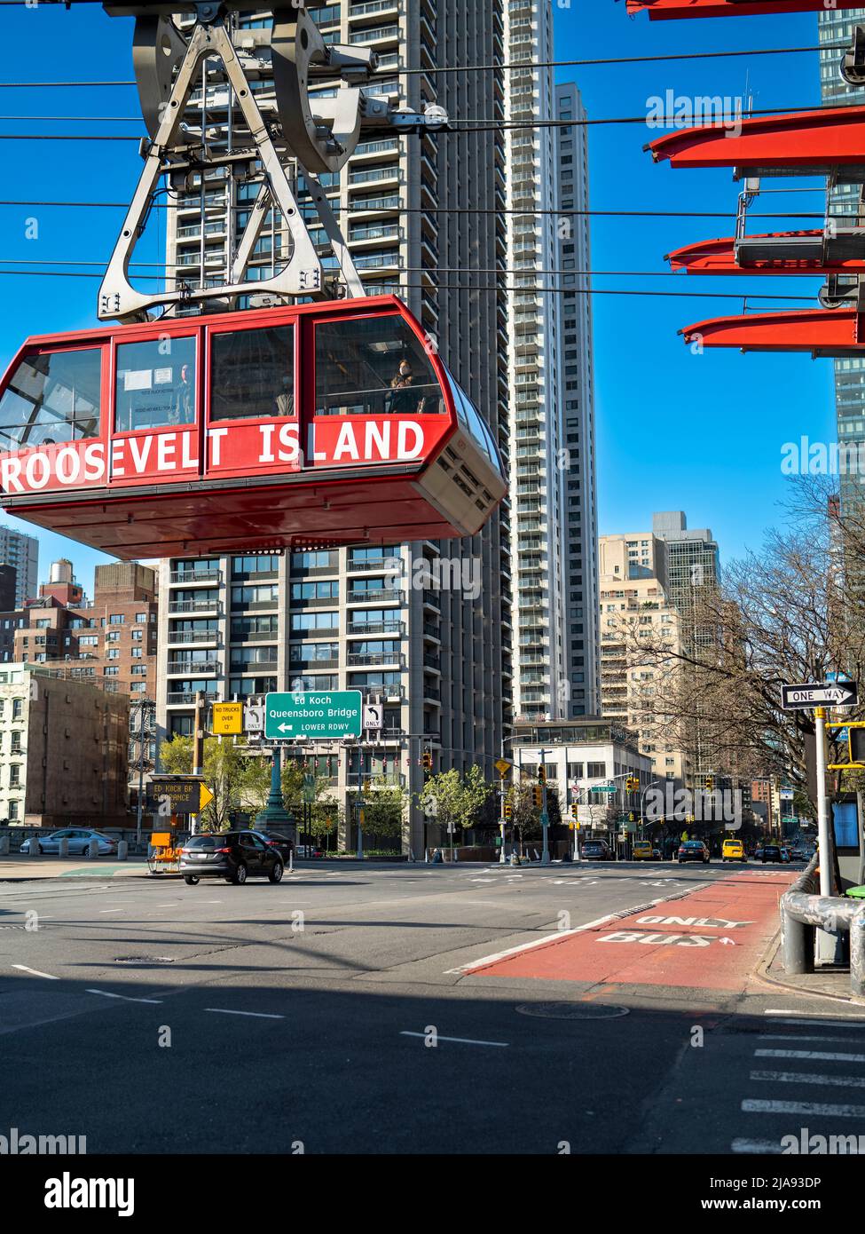 Cable car in New York City above road Stock Photo Alamy