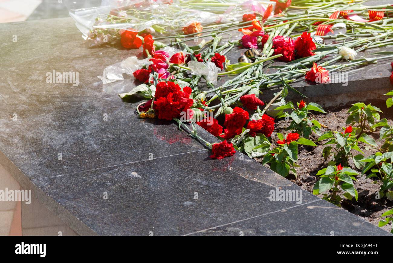 Commemorative memorial. Laying flowers at the eternal fire. Tribute to