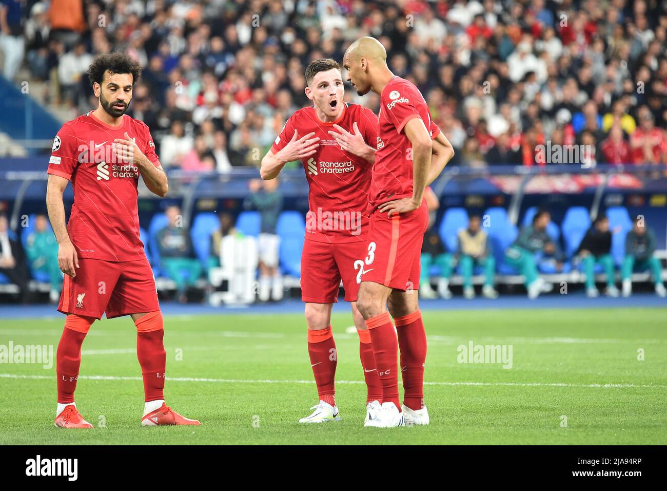 Liverpool's Andrew Robertson heads the ball during the Champions League  final soccer match between Liverpool and Real Madrid at the Stade de France  in Saint Denis near Paris, Saturday, May 28, 2022. (