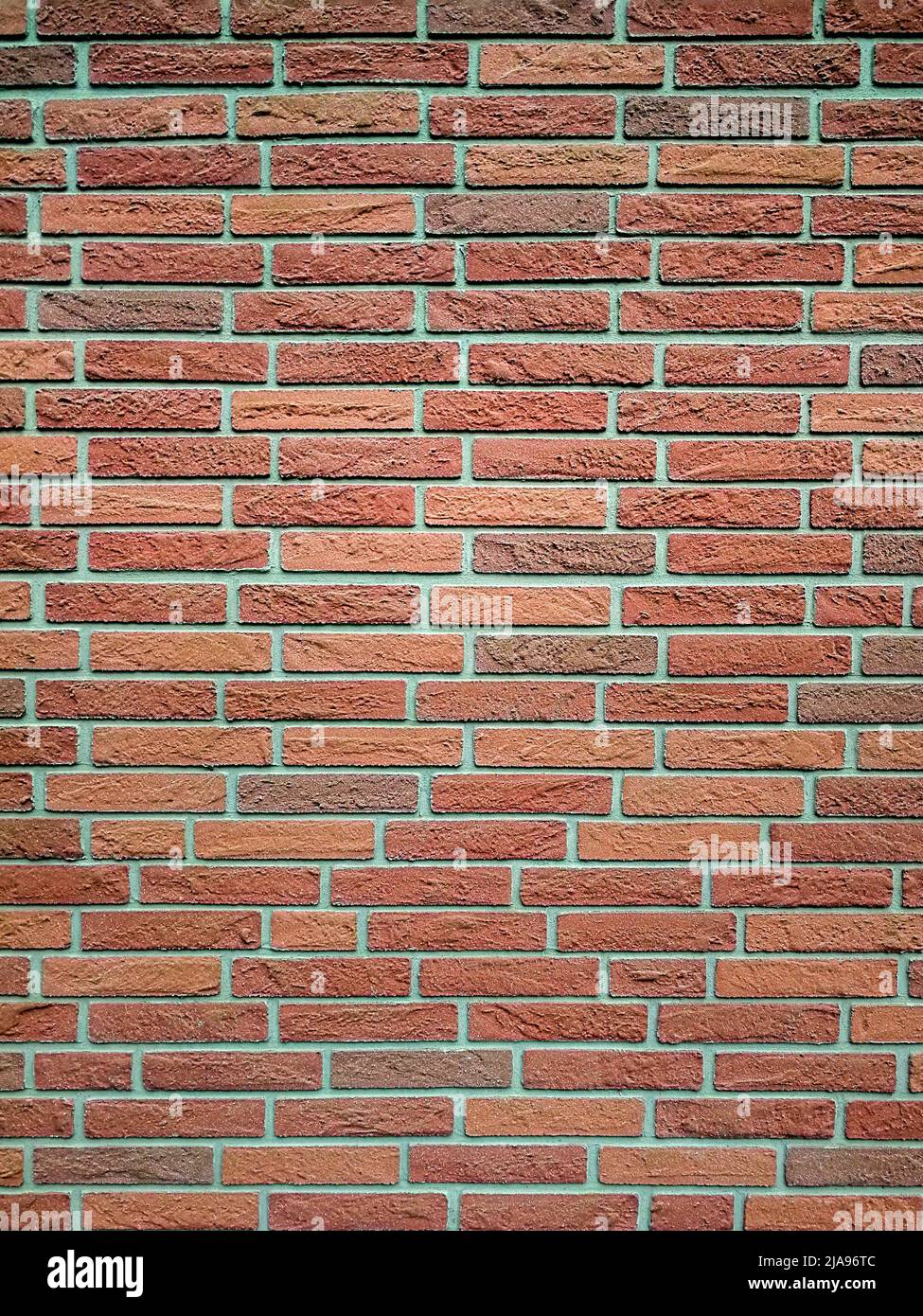 Red brick wall, structure suitable as background Stock Photo