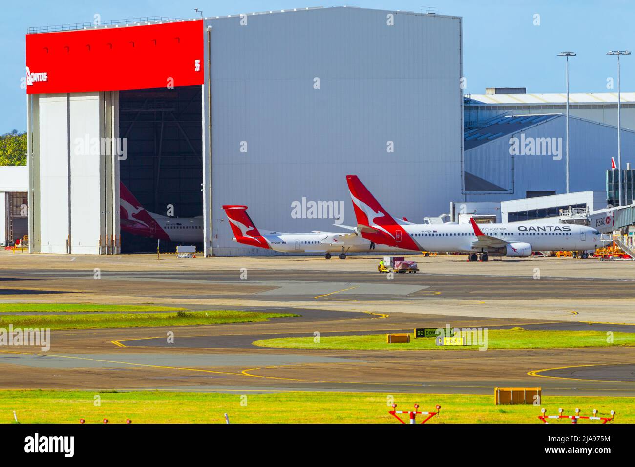 Aircraft movements at Sydney Kingsford Smith Airport on Botany Bay in Sydney Australia. Pictured Qantas jets at Qantas Hangar 96 Stock Photo Alamy