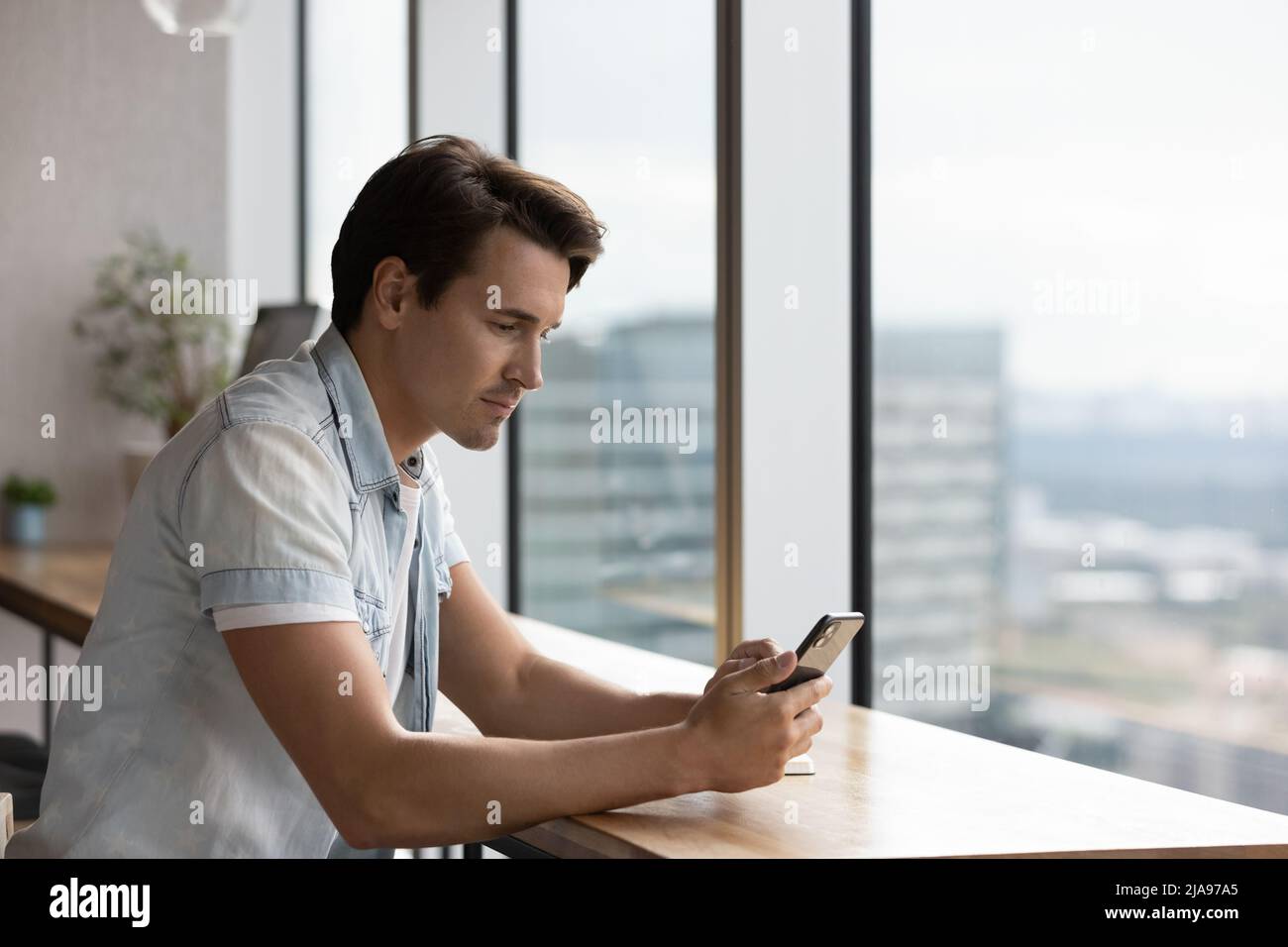 Man Using Online Program Focused virtual conversation hi-res stock photography and images - Alamy