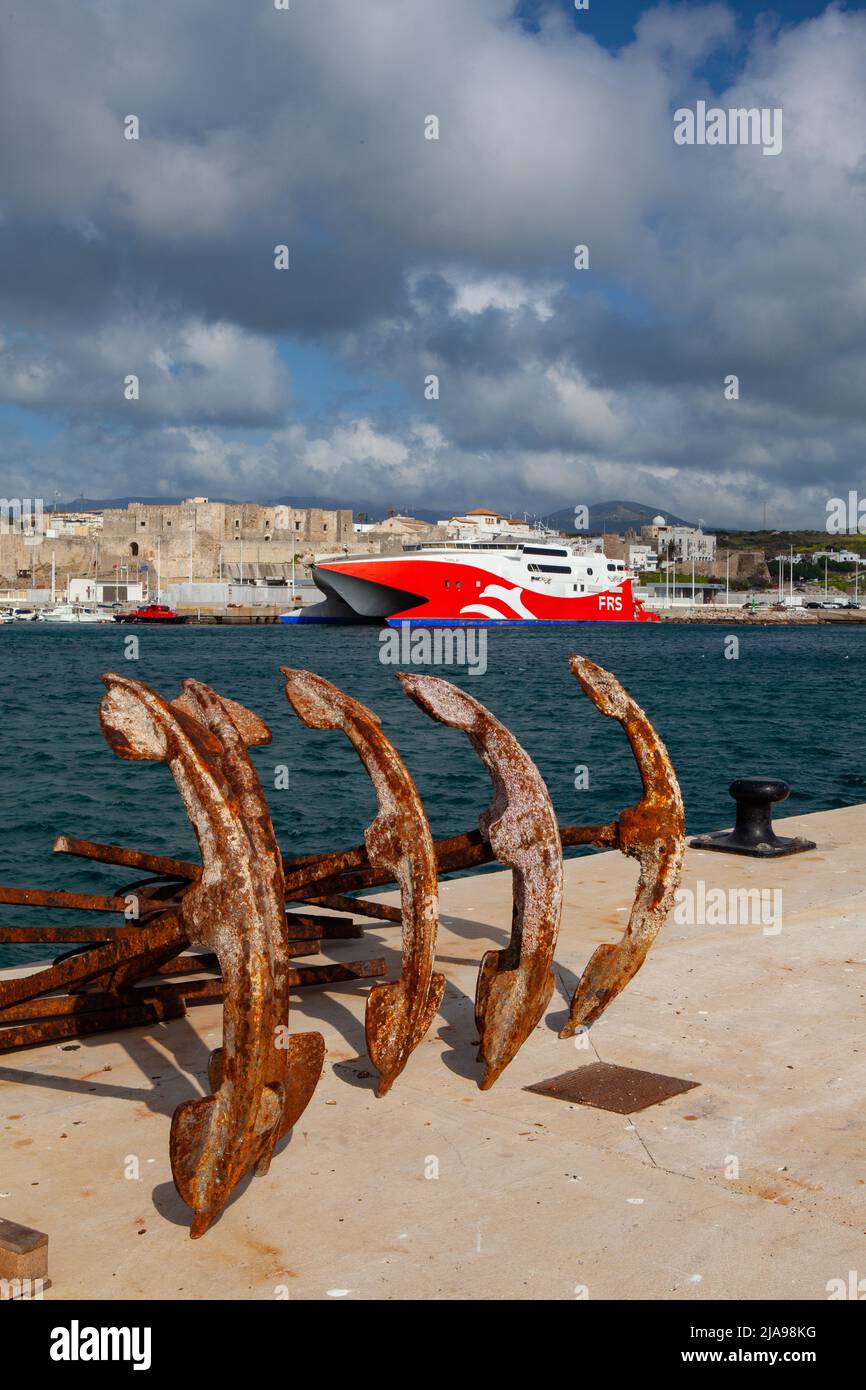 Cordoba, Spain - February 6,2022: Red HSC Tarifa Jet in the Tarifa harbor. It is an 86 m fast catamaran ferry operated by Förde Reederei Seetouristik Stock Photo