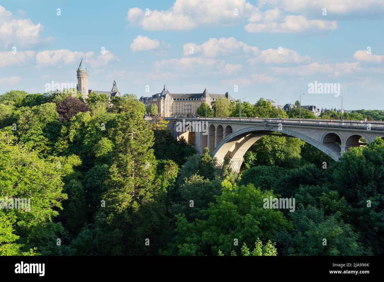 Luxembourg city, May 2022.  Adolphe Bridge. Stone bridge from the early 1900s with a picturesque view from above and a peaceful park at its foot. Stock Photo