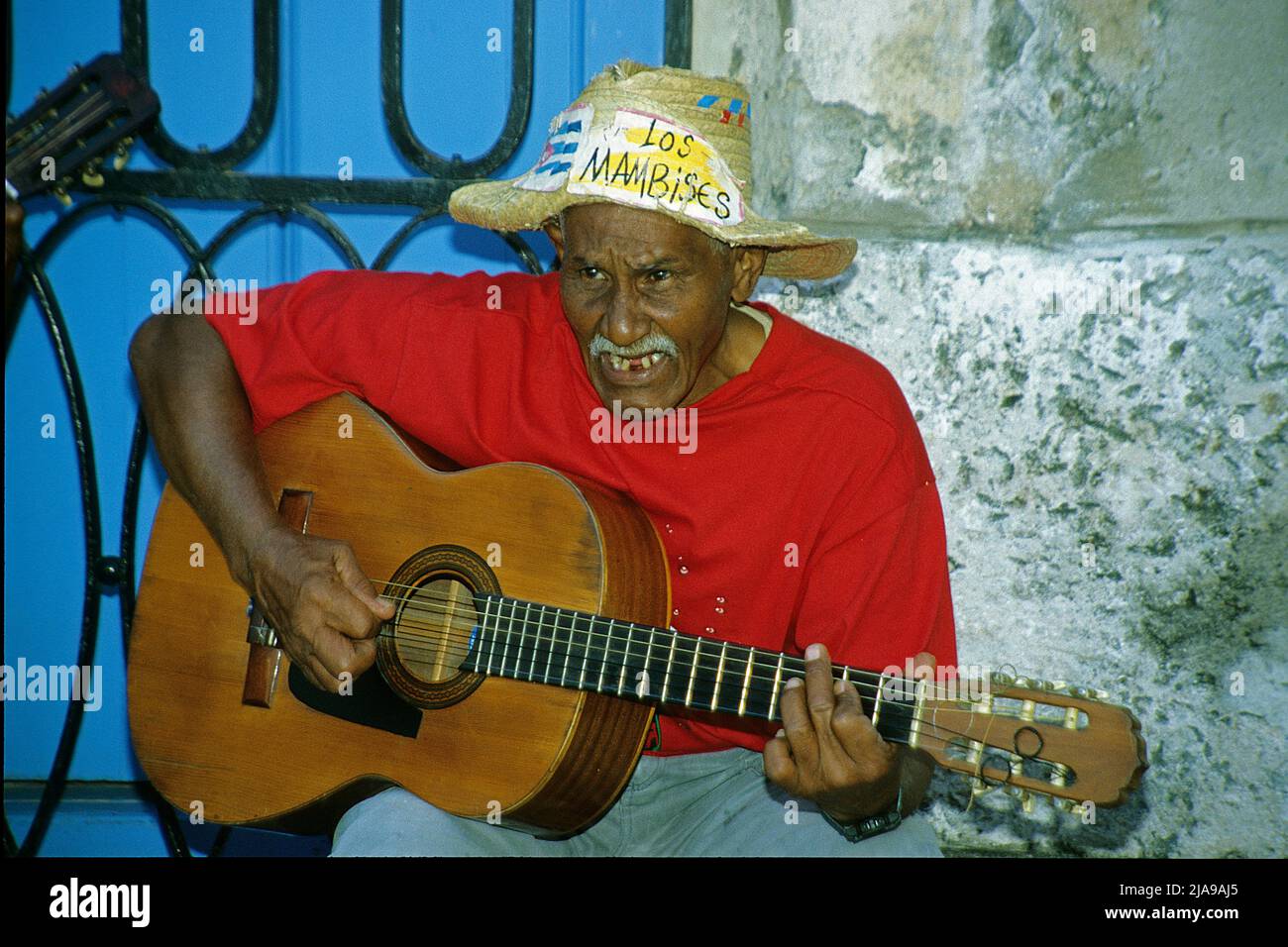 Old cuban man plays guitar, street music at Plaza de la Catedral, Havana, Cuba, Caribbean Stock Photo
