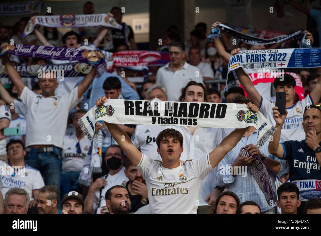 Real Madrid fans watch live on large screens the 2022 UEFA Champions League final match between Liverpool and Real Madrid at the Santiago Bernabeu stadium in Madrid