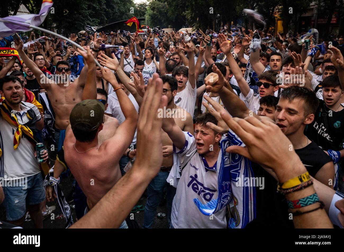 Madrid, Spain. 29th May, 2022. Real Madrid fans gather outside the Santiago Bernabeu stadium before the start of the 2022 UEFA Champions League final match between Liverpool and Real Madrid in Madrid. Real Madrid won its 14th championship after beating Liverpool 1-0 at the Stade de France in Saint-Denis stadium in France. Credit: SOPA Images Limited/Alamy Live News Stock Photo