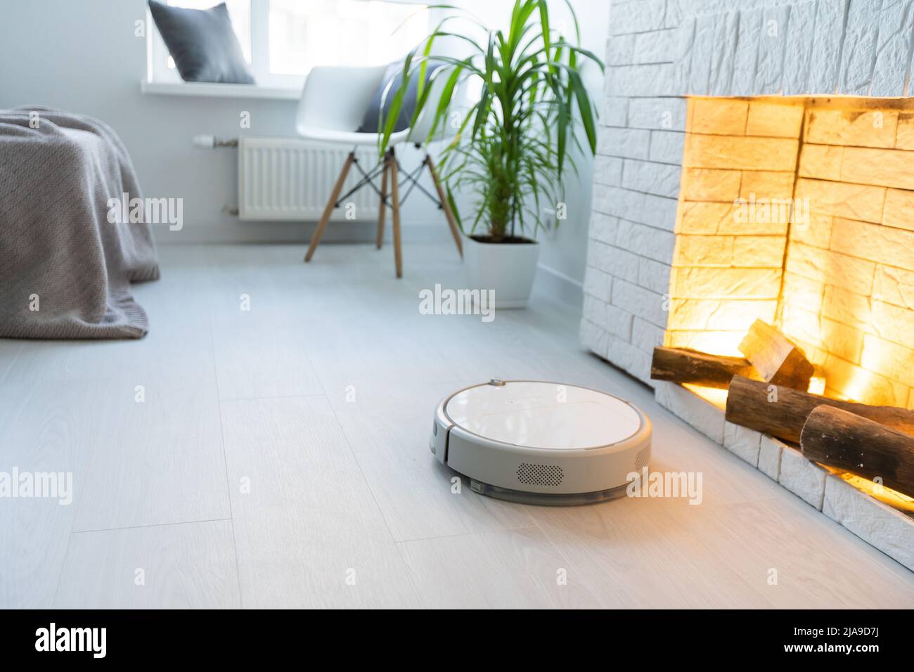 Robot vacuum cleaner performs automatic cleaning of the apartment at a