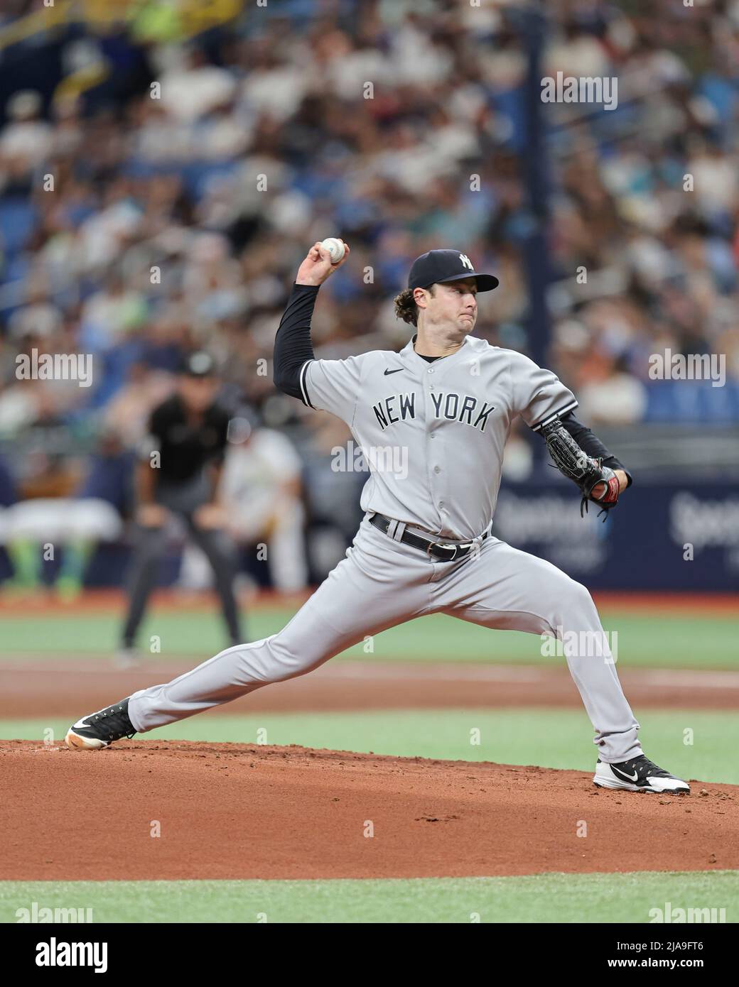 New York Yankees starting pitcher Gerrit Cole flips his hair back