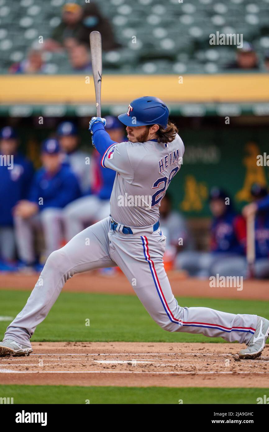 Oakland, USA. 26th May, 2022. Texas Rangers catcher Jonah Heim (28) swings  at a pitch during the second inning against the Oakland Athletics in  Oakland, CA Thursday May 26, 2022. (Image of