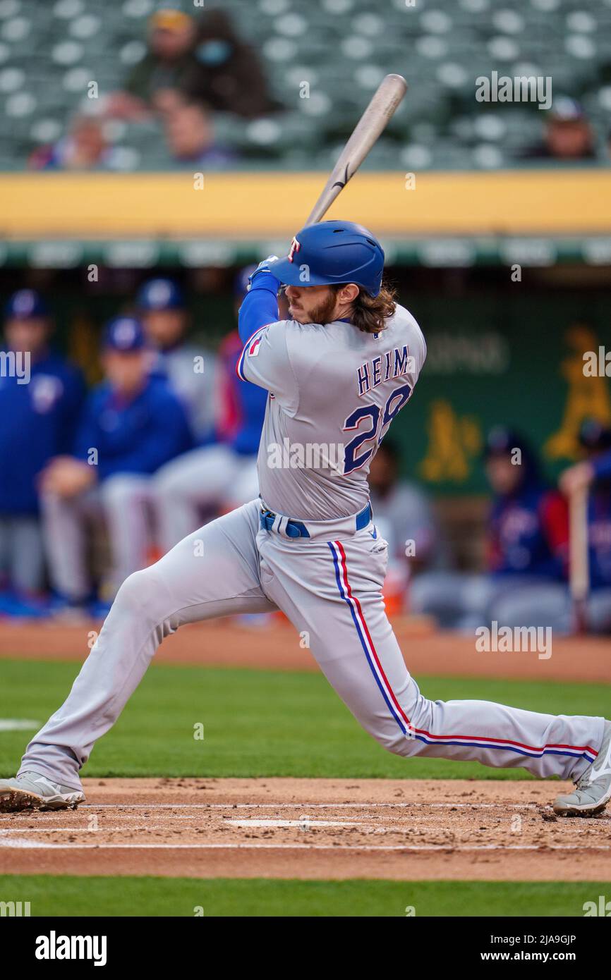 Oakland, USA. 26th May, 2022. Texas Rangers catcher Jonah Heim (28) swings  at a pitch during the second inning against the Oakland Athletics in  Oakland, CA Thursday May 26, 2022. (Image of