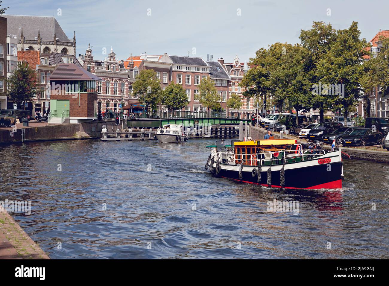 River in Utrecht with bridges boats and tall buildings. Stock Photo