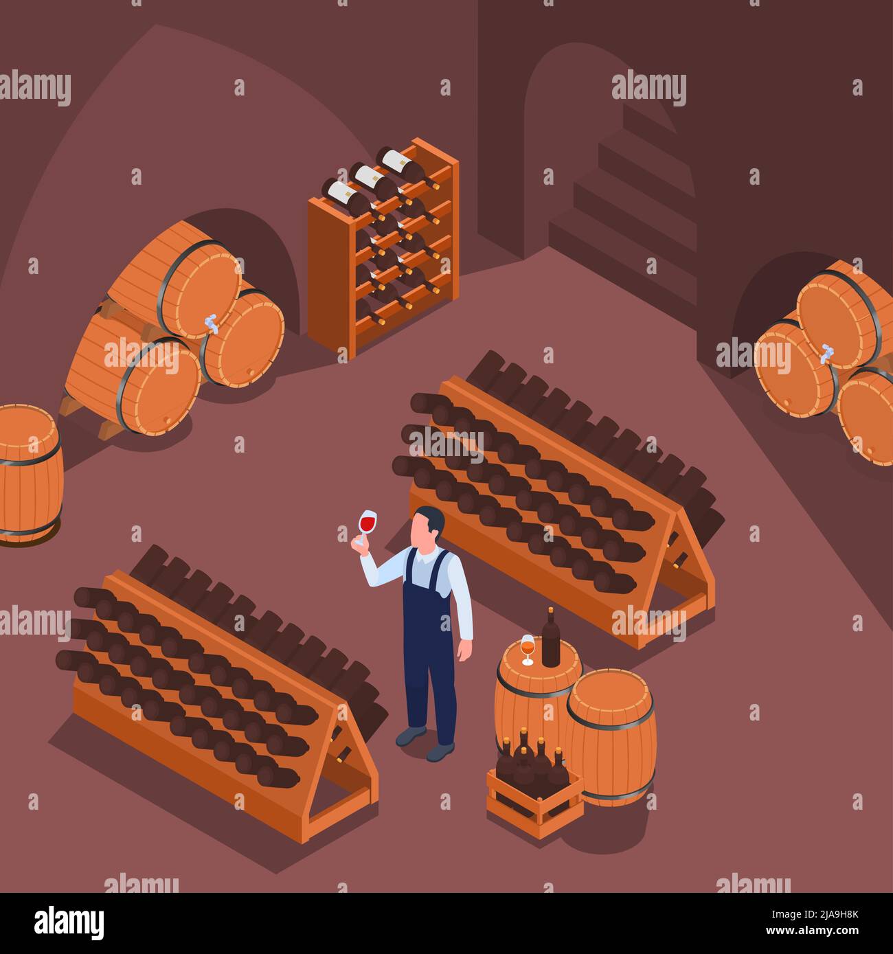 Man in uniform tasting red wine in cellar with wooden barrels and