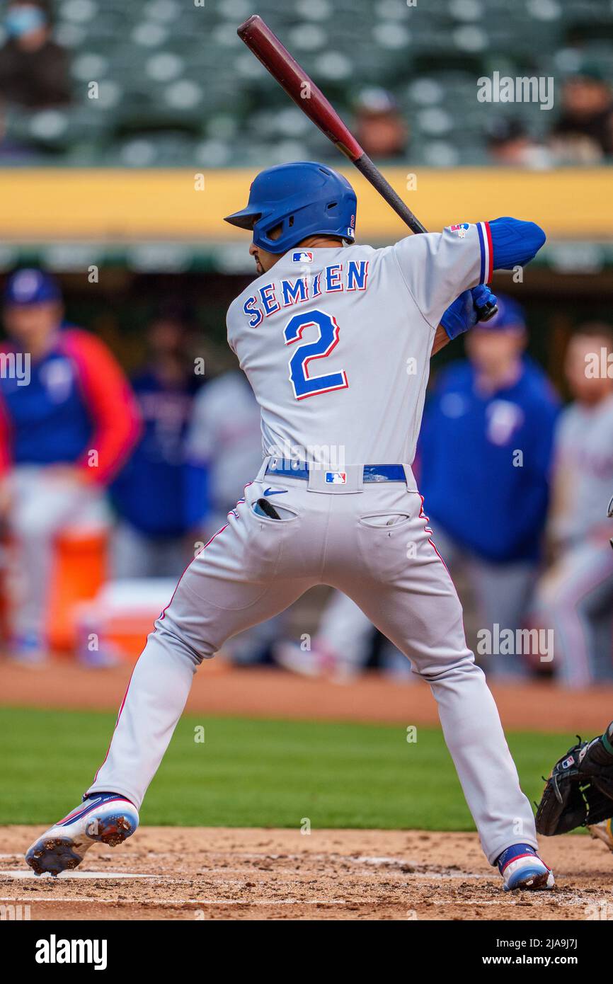 Oakland, USA. 26th May, 2022. Texas Rangers second baseman Marcus Semien  (2) swings at a pitch during the second inning against the Oakland  Athletics in Oakland, CA Thursday May 26, 2022. (Image