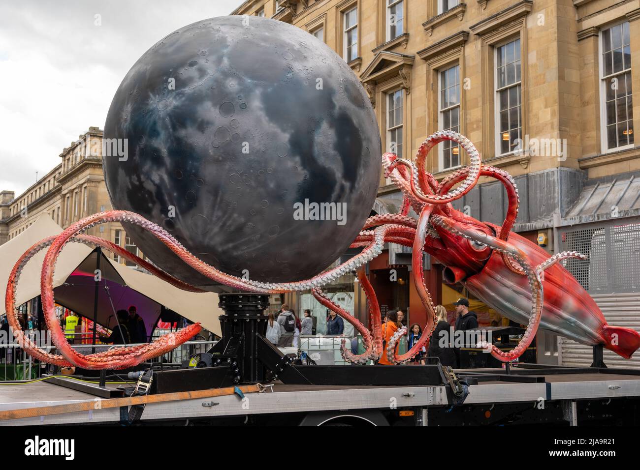 A rotating sculpture of the Moon on the back of a squid at the Tour De Moon  visiting festival. Newcastle upon Tyne, UK Stock Photo - Alamy