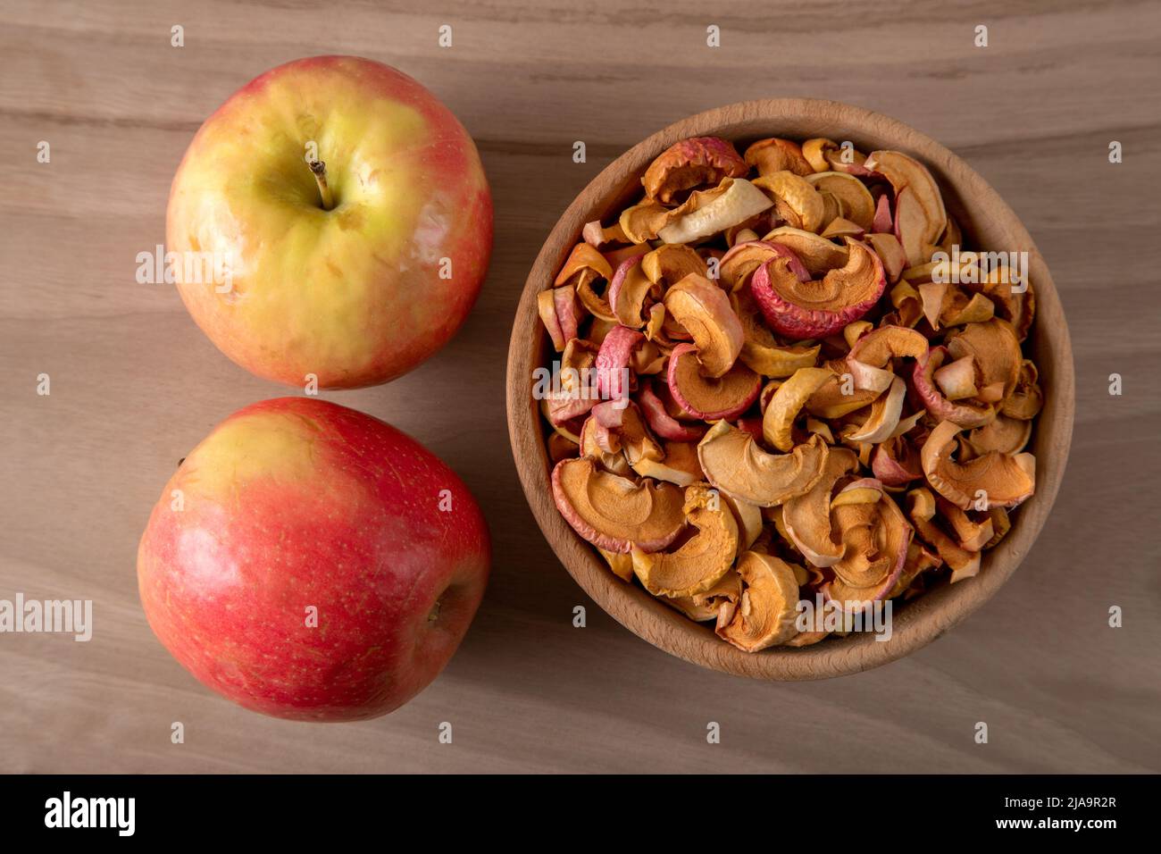 Dried apple slices and fresh apples Stock Photo Alamy