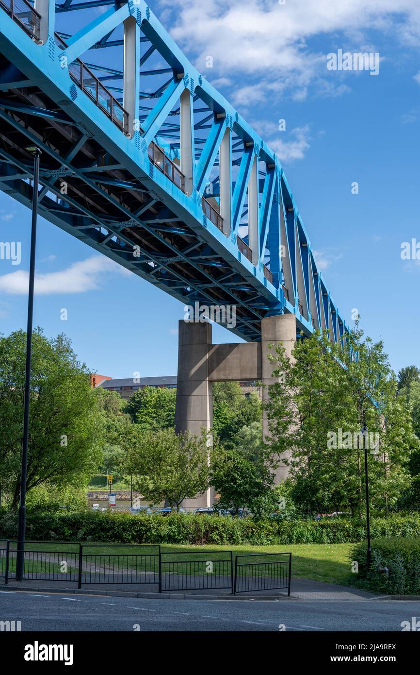 Queen Elizabeth II Metro bridge, a steel through-truss bridge crossing the River Tyne, Newcastle upon Tyne, UK as viewed from below. Stock Photo