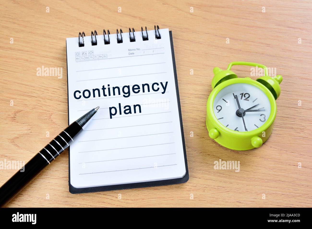 Close up of contingency plan words on notepad Stock Photo