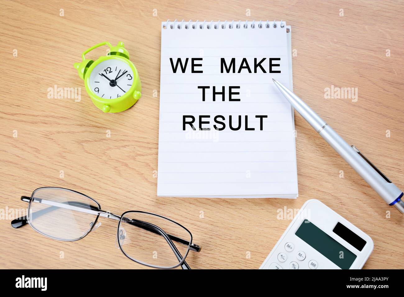 We make the results text on notebook page close up Stock Photo
