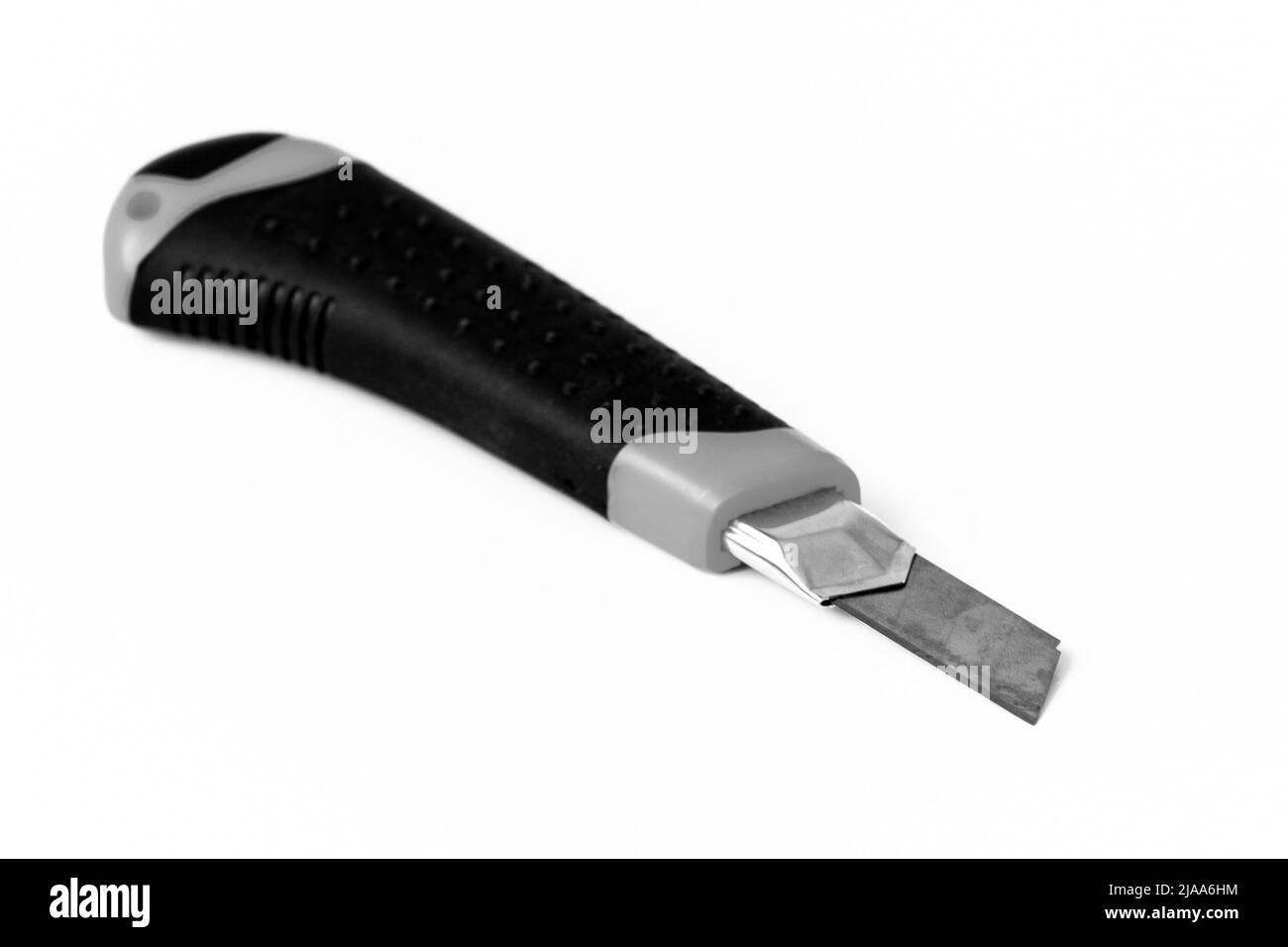 Old used black stanley knife, isolated on white Stock Photo