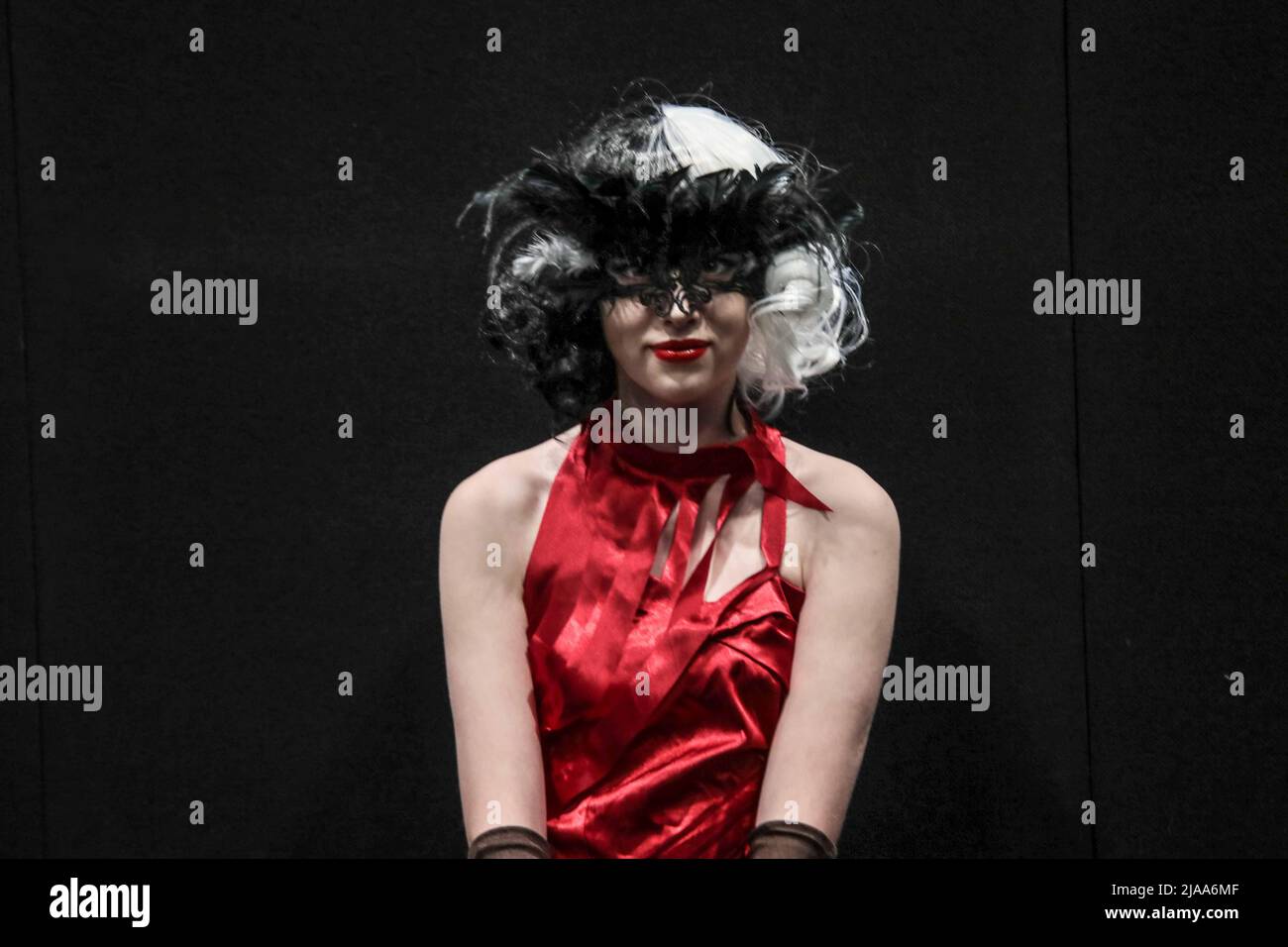 London UK 29 May 2022  Cruella De Vil at The  Last day in London Excel for the eagerly awaited MCM London Comic Con  with its usual array of characters from  Movie Comic Media,  smiles and vibrant colors,Paul Quezada-Neiman/Alamy Live Newsf Stock Photo