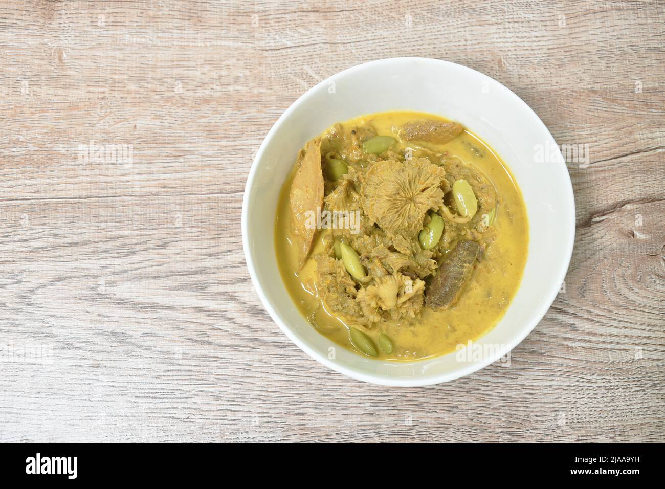 spicy boiled split grill mushroom with roash mackerel fish and Nitta tree seed or luk rieng in