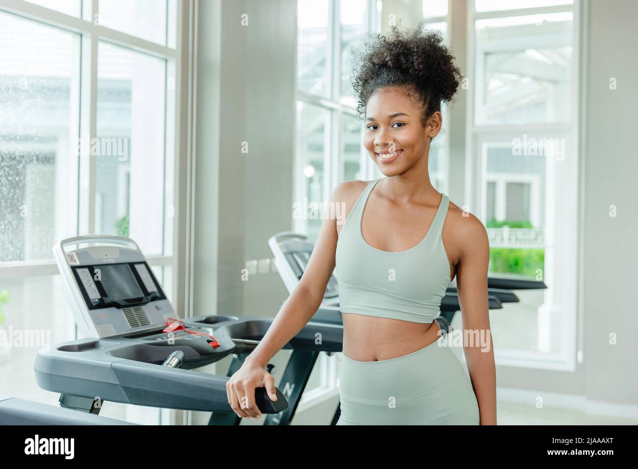portrait healthy young teen black woman in sport club fitness happy smile.healthcare girl workout exercise. Stock Photo